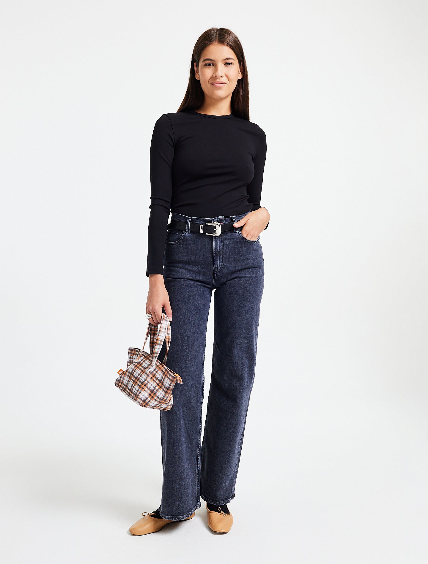 Rose mesure 1m73 et porte le jean flare en 36