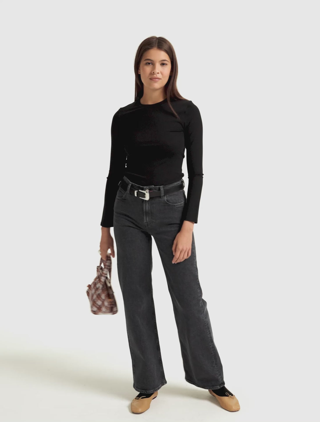 Rose mesure 1m73 et porte le jean flare en 36